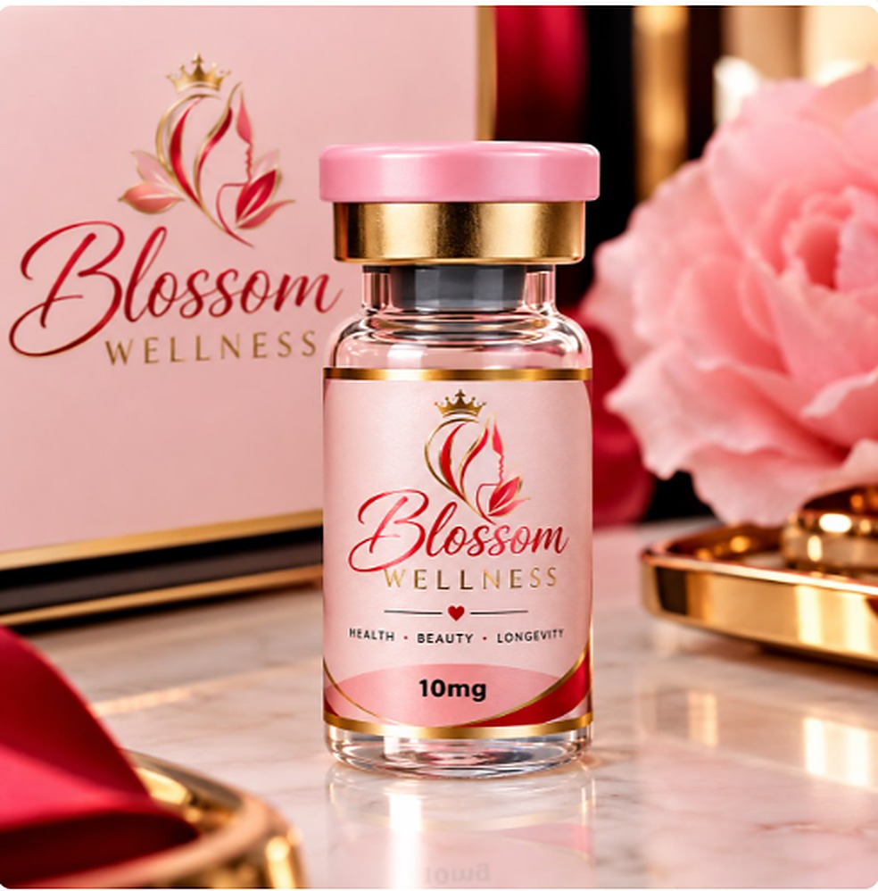 Blossom Wellness 10mg vial beside a pink peony